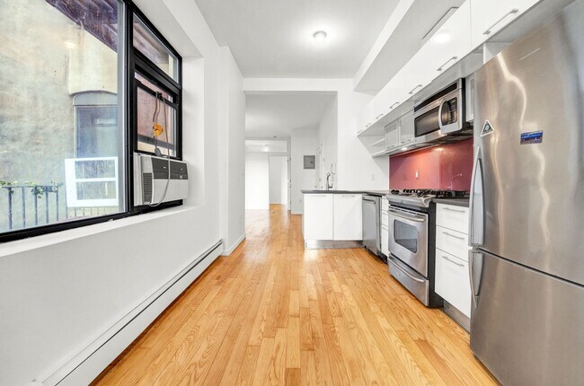 Building Photo - Welcoming  1-Bedroom with Home Office and Private Terrace.
