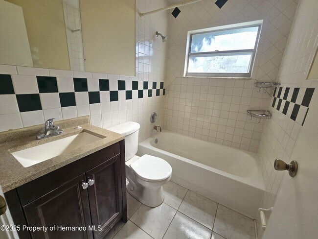 Building Photo - 8915 Woodmill Dr