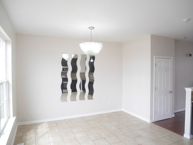 Building Photo - Rare Find! 4 Bedroom, 2 Bathroom Townhome ...