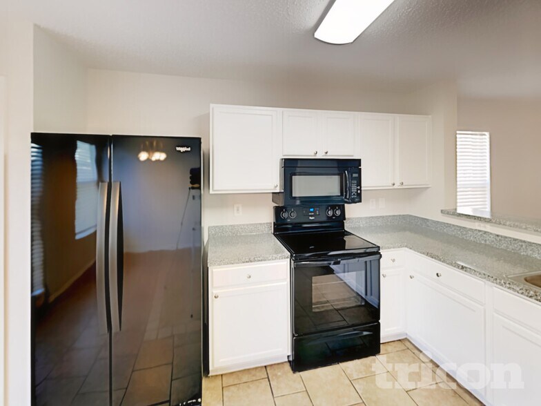 Building Photo - 4604 Palm Ridge Dr