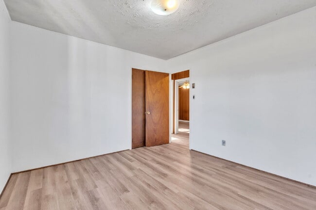 Building Photo - Well maintained 3BR, 1BA single family home with yard, carport and storage shed on quiet road in ...