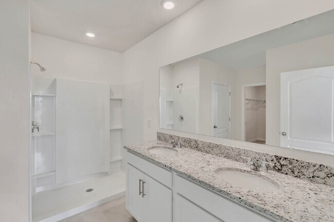Building Photo - 4 bedrooms and 2 bathrooms, the spacious 1,828 sq ft home features an open concept with a 2 car g...
