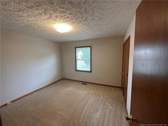 Building Photo - 8516 Amish Dr