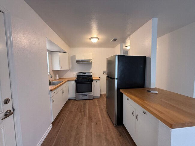 Building Photo - Charming 3-Bedroom Home with Hardwood Floors & Spacious Backyard