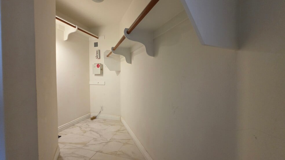 Large primary suite walk in closet - 644 Warwick Ave