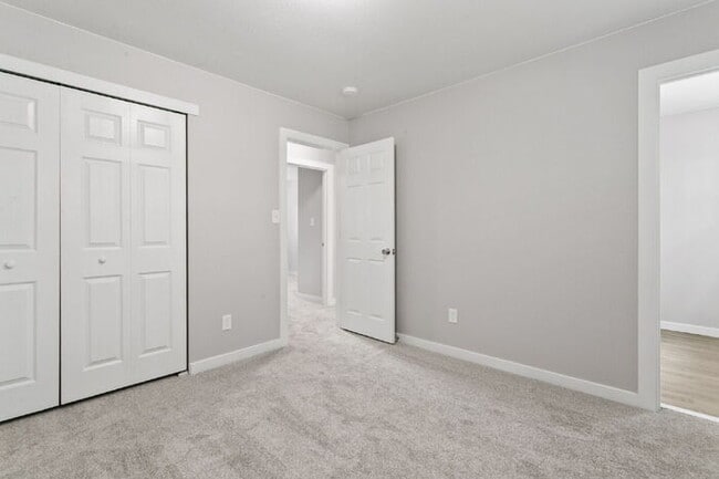 Building Photo - Freshly Renovated 4-Bedroom Home with Over...