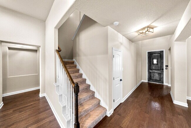 Building Photo - No Rear Neighbors, 3 Car Garage, a Chef's Kitchen, and Room for Everyone