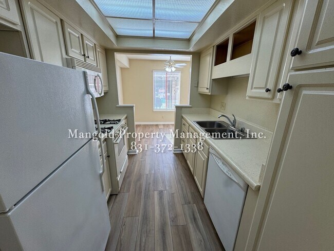 Building Photo - 2-Bedroom 1-Bath Condo with Fireplace, New...