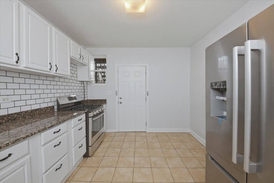 Building Photo - 6541 S Woodlawn Ave