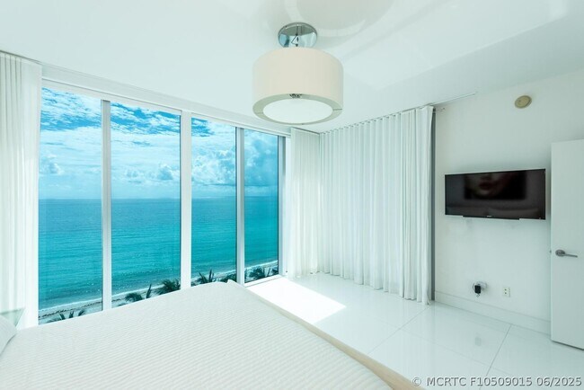 Building Photo - 6899 Collins Ave