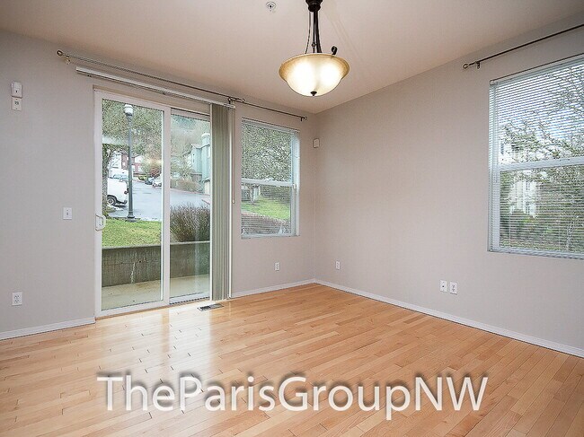 Building Photo - Remarkable River Ridge TH * 3br+Bonus * 2car Garage *Outdoor Rec