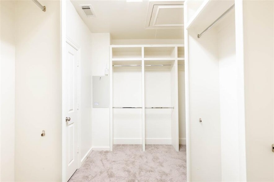 Primary Closet Offers Custom Built Ins - 643 Hartman St