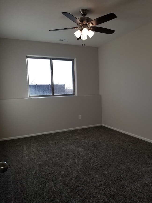 Building Photo - Daylight ranch townhome with 2 stall garage.  Private driveway and covered deck. high end finishe...