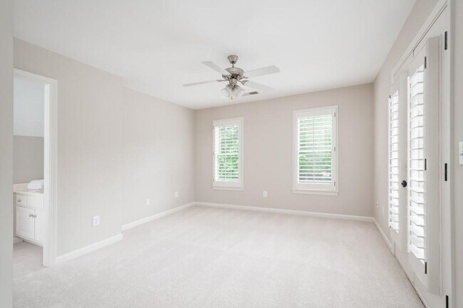 Building Photo - Elegant Master-on-Main in Prestigious Laur...