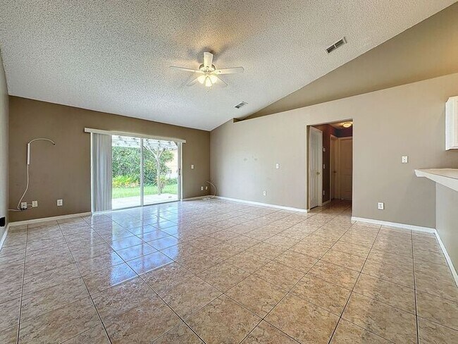 Building Photo - Poinciana single family home in Village 7,...