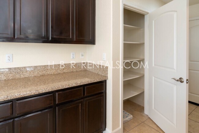 Building Photo - Spacious 4-Bed, 3-Bath Home with a Beautiful Garden in Mountain House! *FIRST FLOOR BEDROOM and F...