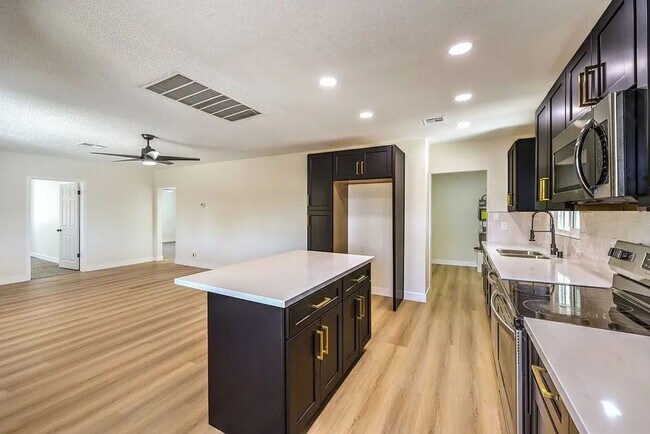 Building Photo - Coming Soon! 3bed 2 bath plus Casita HUGE LOT for all your RV & recreational storage needs