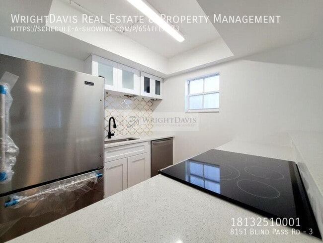 Building Photo - 8151 Blind Pass Rd