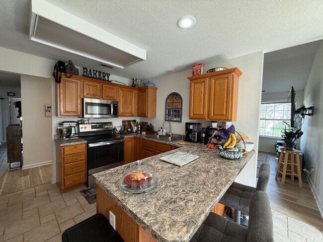 Building Photo - Spacious 4BR Home in Seven Oaks with Garage & Fenced Yard