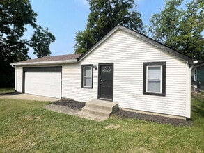 Building Photo - 2 Bedroom with huge, attached garage/workshop combo (has electricity)