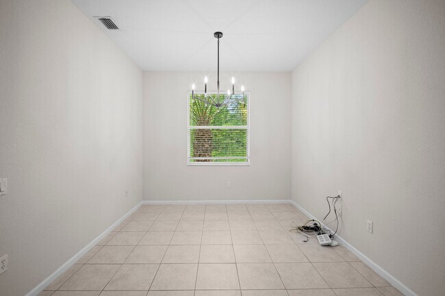 Building Photo - ANNUAL RENTAL - 3 Bedroom, 2 Bath w/ Garag...