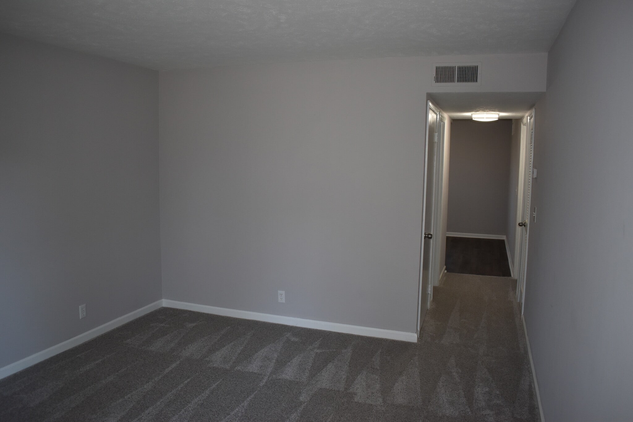 Upstairs living room - hallway to stairs, kitchen, bathroom and upstairs bedroom - 610 River Rouge Dr