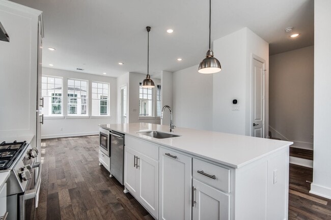 Building Photo - Welcome to a beautiful Craftsman-style Tow...
