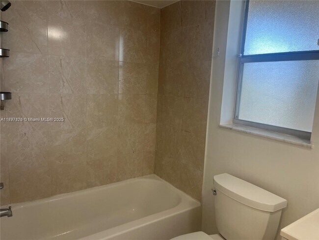 Building Photo - 8285 Sunrise Lakes Blvd