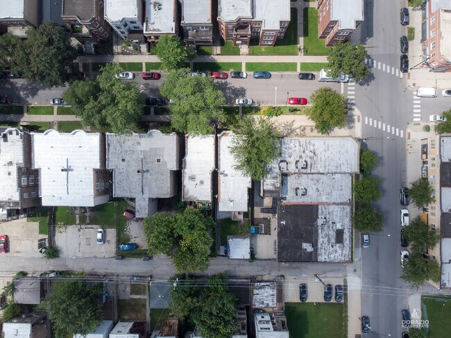 Building Photo - Modern 4BR Apartment with Hardwood Floors, Balcony & Central A/C