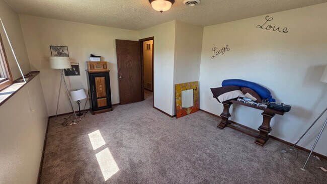 Building Photo - Cute Twinhome is South/Central Bismarck