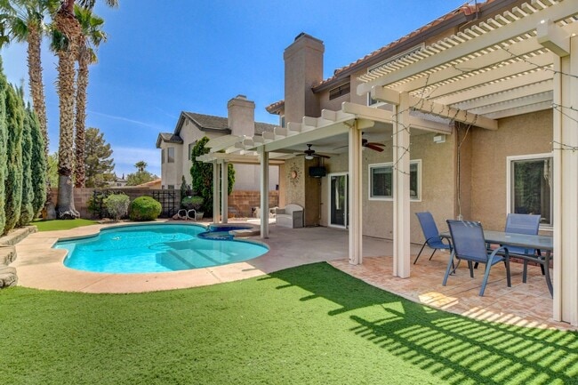 Building Photo - Gorgeous 4 Bedroom, 2 Story Home with a Beautiful Pool in the Lakes!