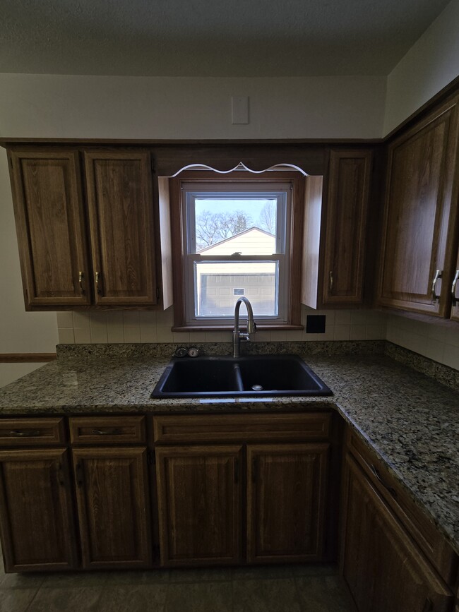 kitchen with granite counter tops - 97 Grimm Heights Ave