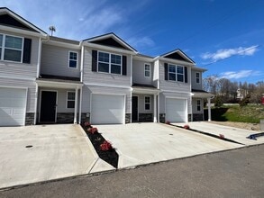 Building Photo - Beautiful New Construction 3 bedroom 2.5 Condo   with garage- Water, trash & sewer incuded!