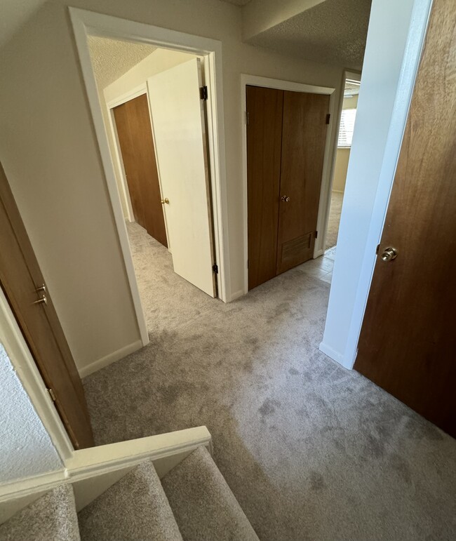 storage under the stairs, linen closet - 1418 Kay St