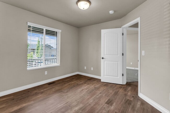 Building Photo - Spacious Syracuse Home with Covered Deck, Loft & Oversized 3-Car Garage