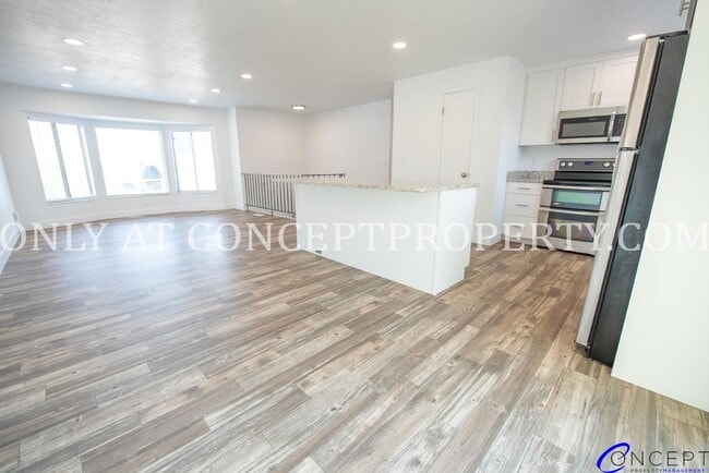 Building Photo - Newly Remodeled 5-Bedroom Home | 2-Car Gar...