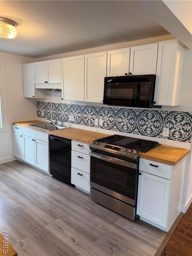 Building Photo - 1119 NORTH MCNIGHT ROAD | UNIVERSITY CITY 63132