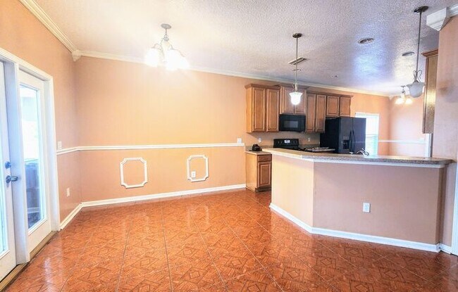 Building Photo - Spacious 4BR w/ Fenced Yard + Covered Lanai + 2 Car Garage  in Orange Park!