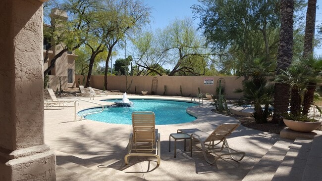 Building Photo - Luxurious 2-Bed/2-Bath Condo in Quiet Gated Community - Coming Soon!