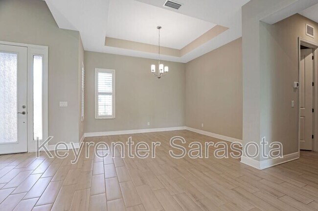Building Photo - 6133 Lungo Lago Dr