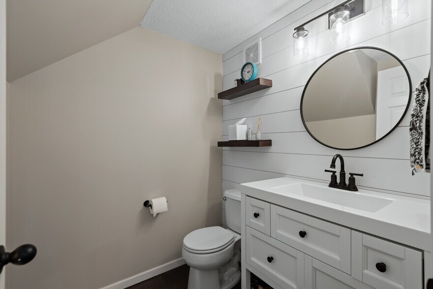 Main Floor 1/2 Bath - 13055 Europa Trail Way N