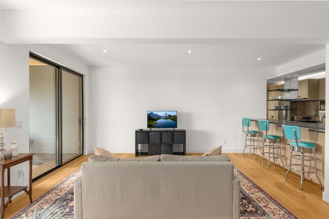 Building Photo - Stunning remodeled apartment with large walk-out patio