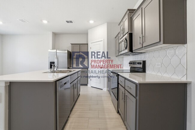 Building Photo - Inviting 4-Bedroom Layout with Flexible Living Areas