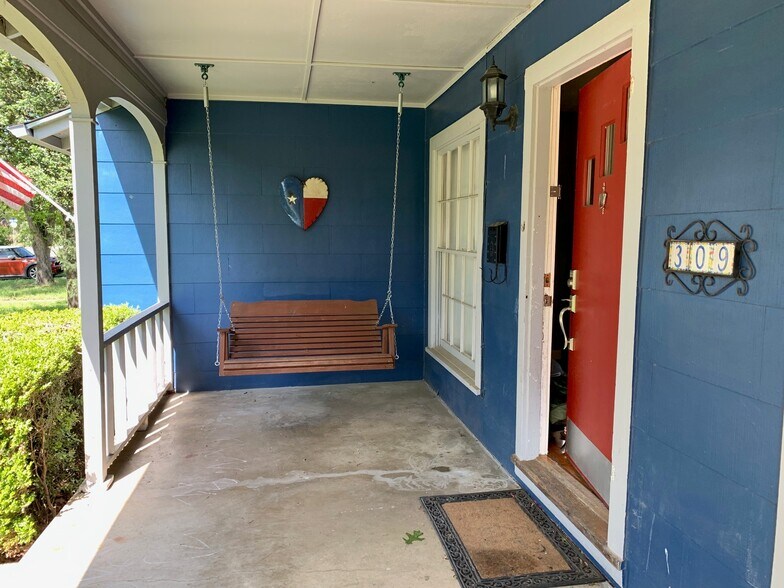 Front porch swing and enough room for rocking chairs - 309 Irvington Dr