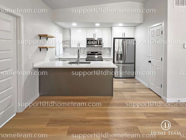 Building Photo - "Charming 3-Bedroom Retreat with Cozy Fire...