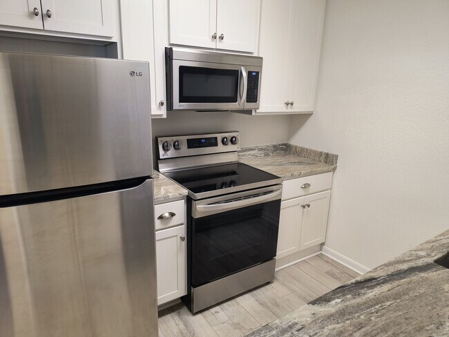 Building Photo - NEW LOWER PRICE  Wonderful 2 Bedroom 1.5 Bathroom condo