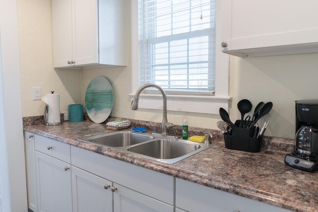 Building Photo - Beautiful Three Bedroom with Private Beach...