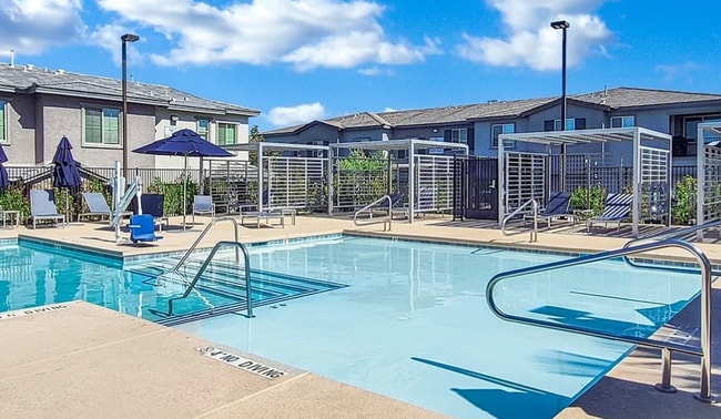 Building Photo - Beautiful townhome features a bright, open-concept layout