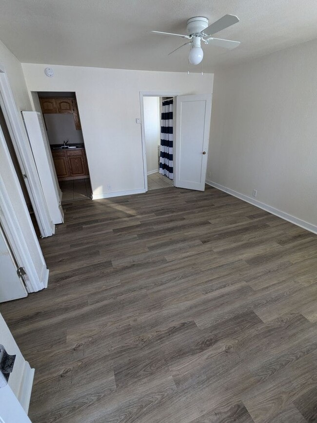 Building Photo - Ground Level 2 Bedroom, 2 Bath apartment. New flooring and paint. Tenant pays electric and natura...