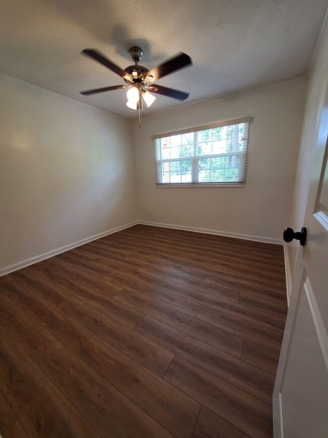 Building Photo - !!500!! Move-IN Discount  Spacious 4BR/2BA Home with Brick Exterior, Large Open Living Area, and ...